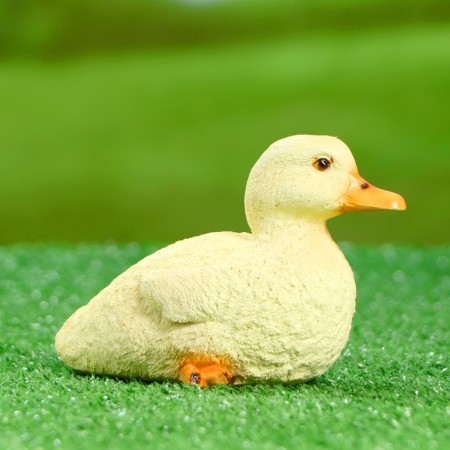 Garden figure "Duckling sits" 14x8x10cm