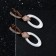 Earrings ceramics "oval" hanging, white color in gold