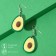 Avocado plastic earrings are large, the color is green-brown
