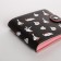 Wallet on the button, the color is black