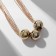 The necklace "stereo" is three beads, 6 threads, color gold, 40 cm
