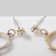 Emall earrings "Panda" on rings, black and white color in gold
