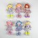 Soft doll "Masha", a flower dress, color mix