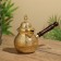 Turk with a lid of 17x23x10 cm, brass