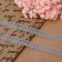 Capricon lace, 12 mm × 10 ± 1 m, light gray color