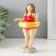 Polystone souvenir "Pill in a striped swimsuit with an inflatable circle" 9x6.5x15.5 cm