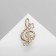 Brooch "Violin key" and notes, white color in gold