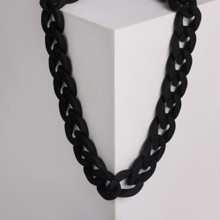 The necklace "chain" is flat links, black color, 48cm