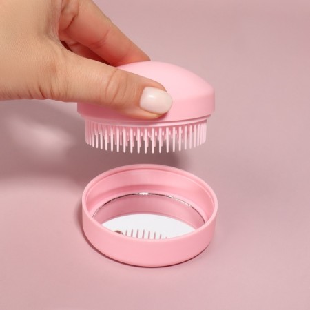 The comb is massage, round, folding, with a mirror, d = 7.5 cm, in the box, the color is pink-4