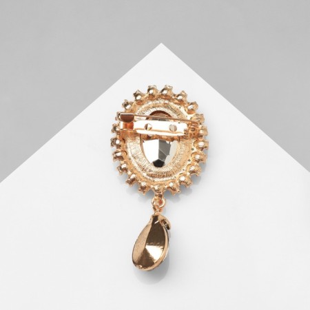 Obval brooch with a drop, green color in gold-3