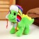Soft toy "Dragon", in a multi-colored hat-earflame, 16 cm, green color