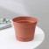 Pot for flowers with a minute pallet, 700 ml, d = 12 cm, h = 9.4 cm, terracotta color