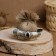 The amulet "Kolobok with bucks", on the saw, 12 × 12 cm, mix