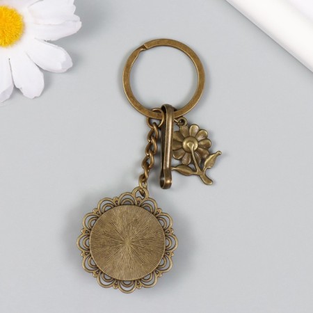 A metal keychain, glass with a carbine "Flower and patterns in the medallion" Bronze 9.5 cm-3