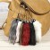 Fluffy on the suspension "tail" color h = 12 cm, mix