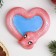 New Year. Symbol 2025. Figure soap "Snake Heart" pink with blue