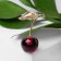 Brooch "Cherry" with a leaf, the color of burgundy-green in gold