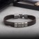 Bracelet Leather "Mulan" 4 links, brown color in black silver, l = 20.5 cm