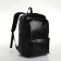 City backpack on a zipper, black color