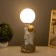 Table lamp "Cosmonaut with moon" 1x40W E14 white/gold 12.5x12.5x33cm