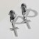 Earrings Metal "Crosses" Volumetric Line, Color Silver