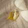 Brooch "Banana" without a peel, yellow color in gold