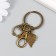 Browler Metal with a carbine "Eagle and leaf" bronze 6.4 cm