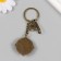 A metal keychain, glass with a carbine "Spider and clover in the medallion" Bronze 9.5 cm
