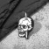 Icon "skull", black and white color in ferrous metal