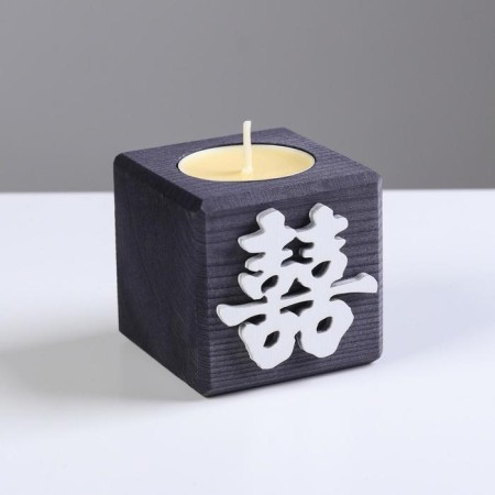 A candle in a wooden candlestick "Cube, hieroglyphs. Happiness", color: "Eben", 6x6x6 cm, mango