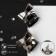 Earrings with rhinestones "bow" with a rectangle, gray color in silver