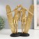 Polystone souvenir "Matter surfing" gold 26x23.5x12.5 cm