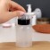 Board with pomp, 250 ml, black/transparent color