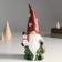 Suvenir Polystone "Santa Claus in a cap with snowflakes, with a bag and a snowman" 10x8x23 cm