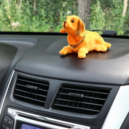 Dog on a car panel shocking his head, a large, red color-3