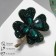 Brooch "Clover" for good luck, emerald color in gold