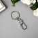 Metal keychain "Carabine bird" 7x2.7x2.7 cm