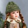 Doll Collectible Ceramics "Vasilisa in a beige dress, green jacket" 30 cm