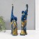 Souvenir Polystone "Blue elephants with orange rhinestones" set 28.5x21x8.3 cm