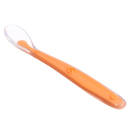 A spoon for a nursery, for the first feeding, in a container, orange-2