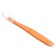 A spoon for a nursery, for the first feeding, in a container, orange