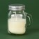 New Year's candle in a jar with a handle "time of magic", the aroma of cherry
