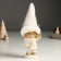 Polystone souvenir "Baby in a white outfit with a snowflake, with a gift/bell" MIX 7x6x18 cm 94988
