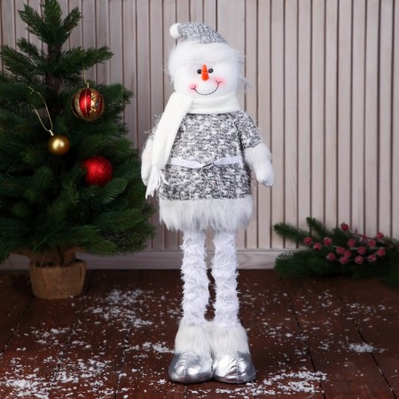 Soft toy "Snowman in the cap and scarf, long legs" stands, white-gray