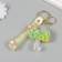 A keychain plastic with a carbine, a strap "Umbrella with lemons" Water with a decor 6x5x2 cm