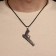 Pendant Pistol's pendant Pattern, color black silver on a black lace, 50 cm
