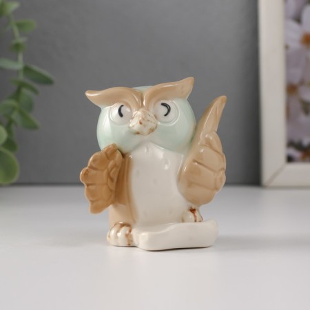 Souvenir Ceramics "Little Filin with a pen and paper" 6.5x5.6x6.4 cm