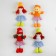 Soft toy "doll", in a hat, color mix