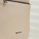 A backpack with a zipper, Textura, external pocket, light-beige color