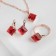 Set 3 objects: earrings, pendant, dimensionless “Edel” rhombus, burgundy color in gold, 45 cm